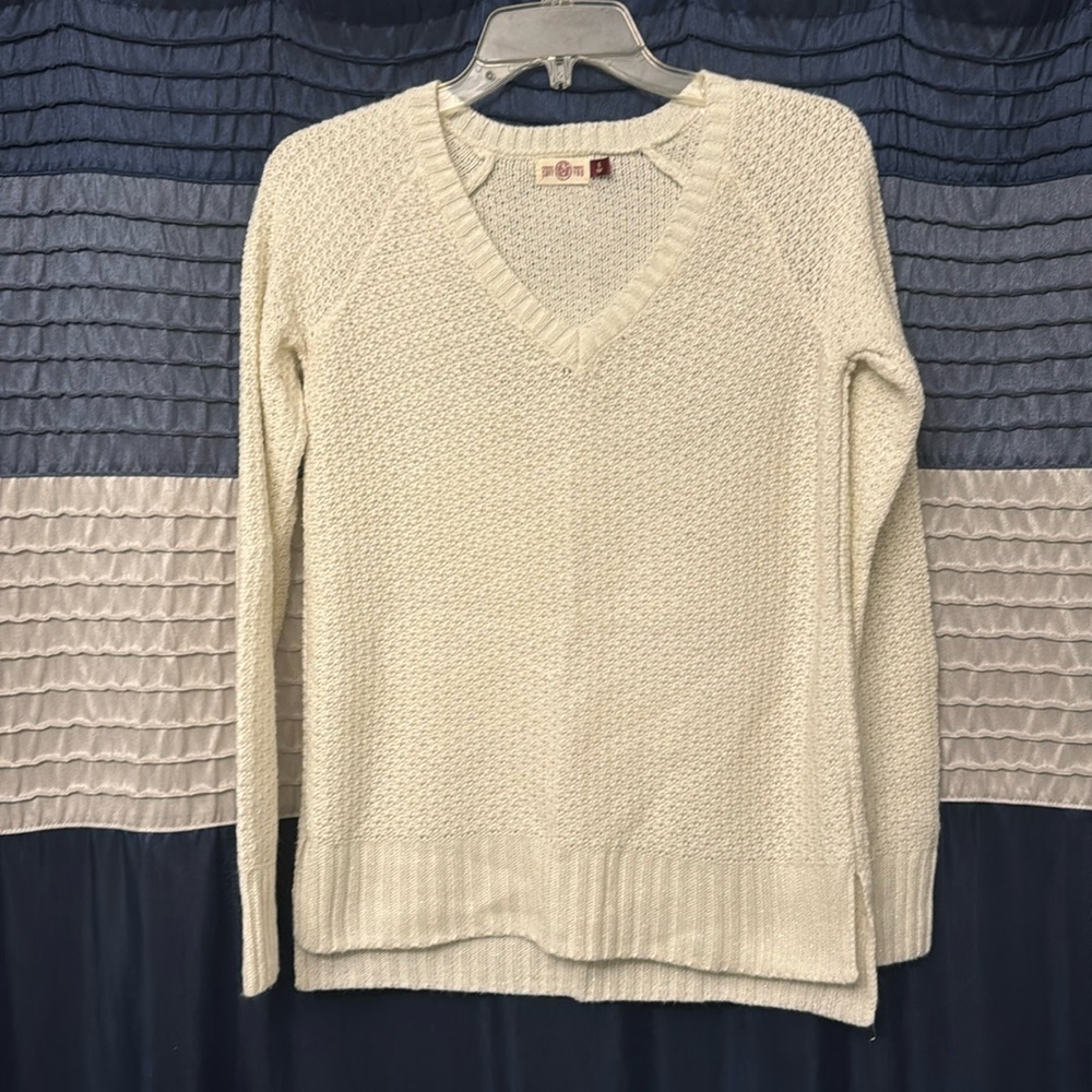 White with silver sweater